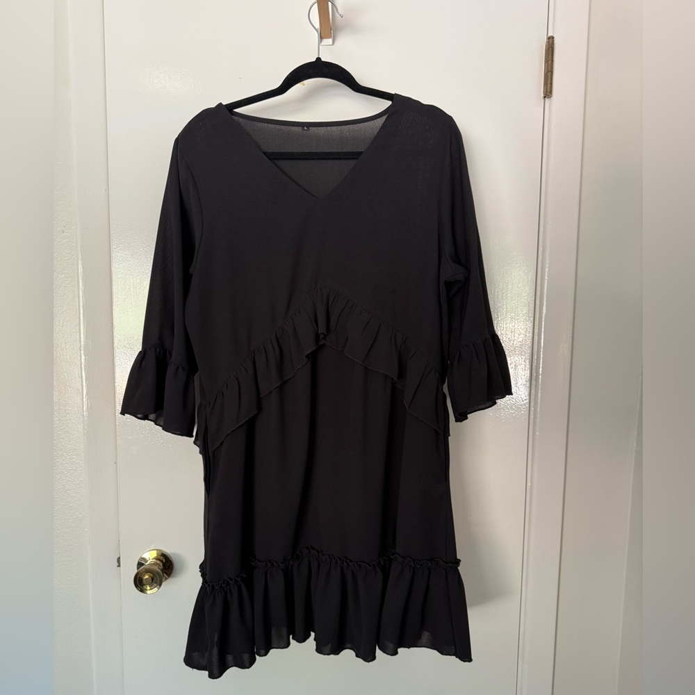Black ruffle mini dress